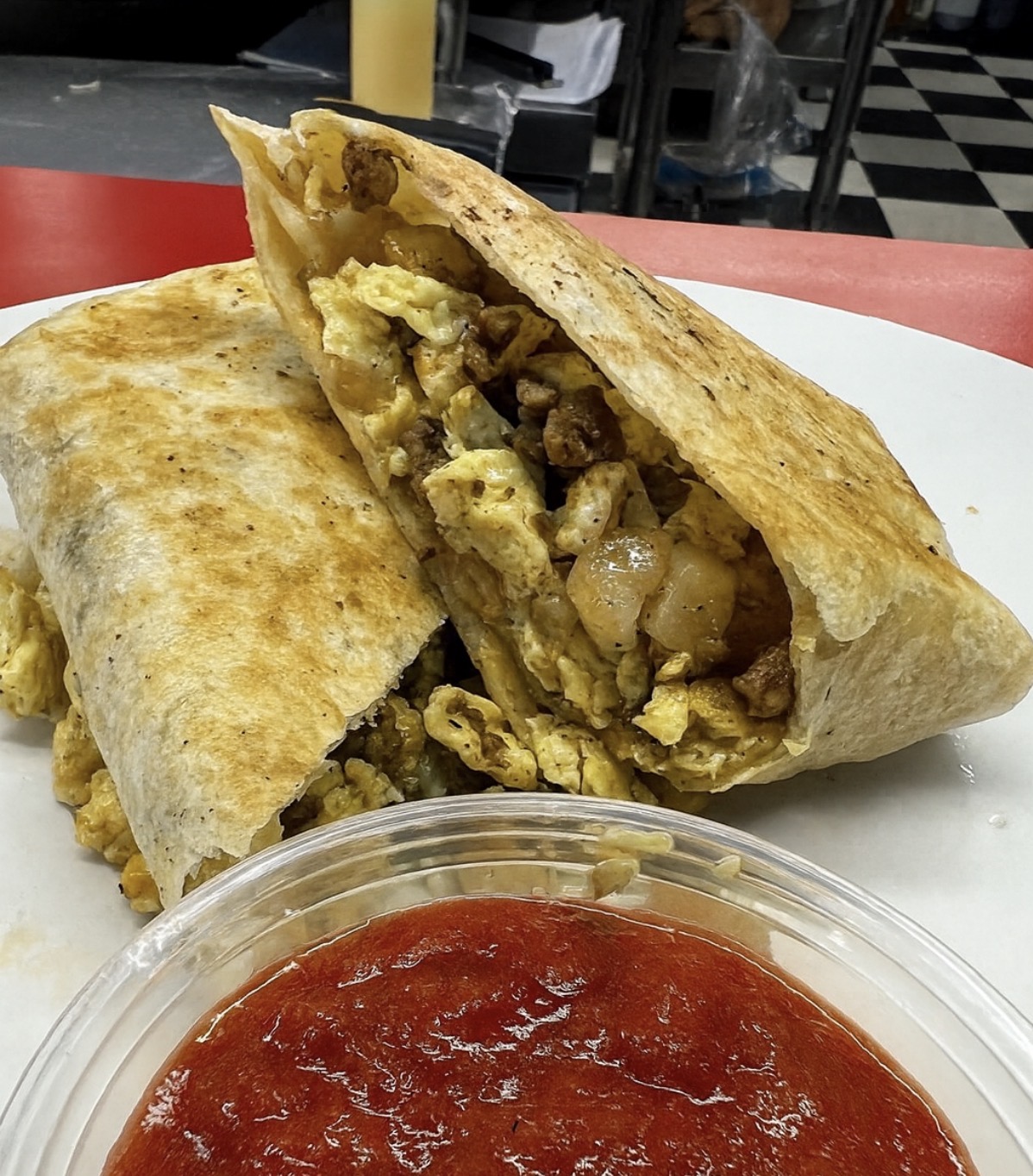 Chicken wrap with a side of salsa
