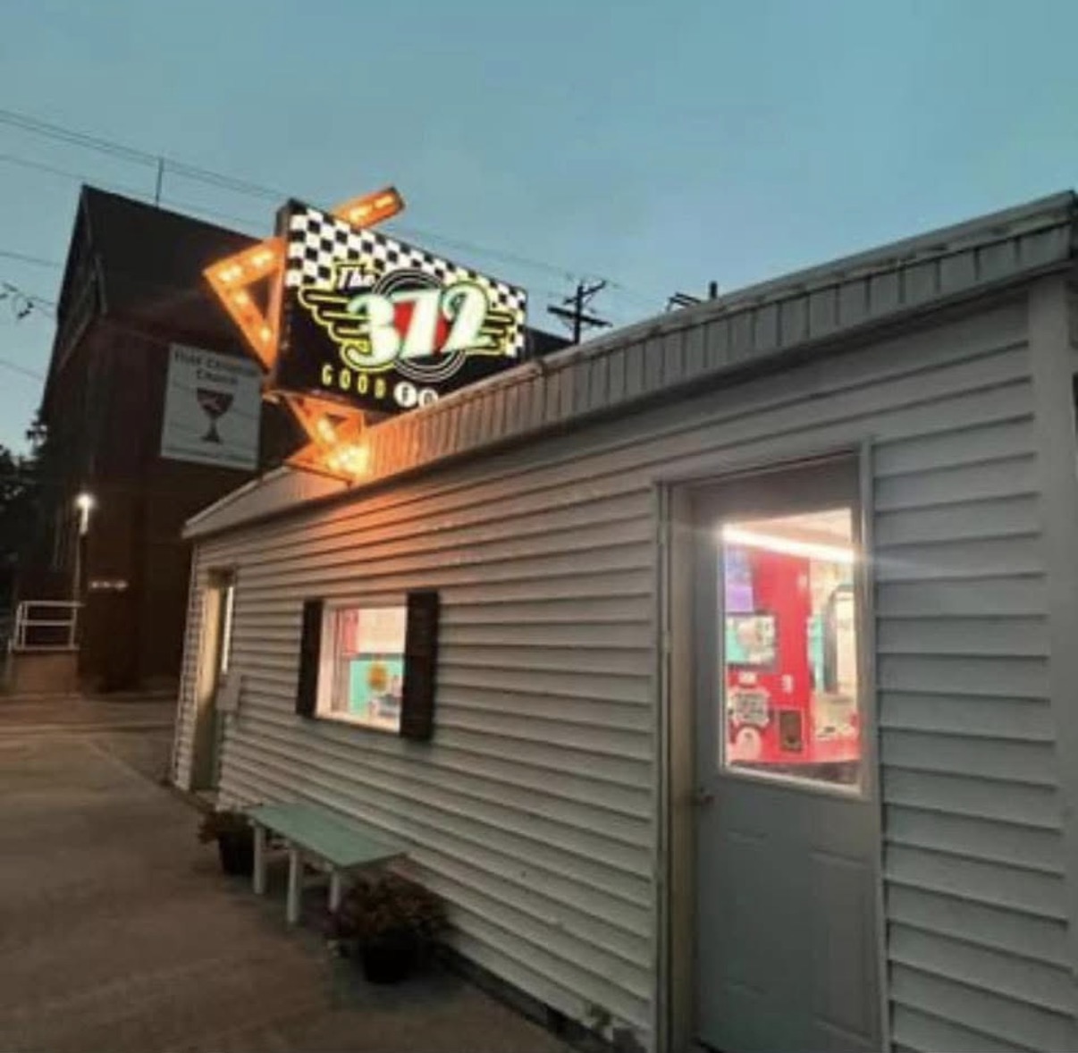 The 372 Diner building and illuminated sign